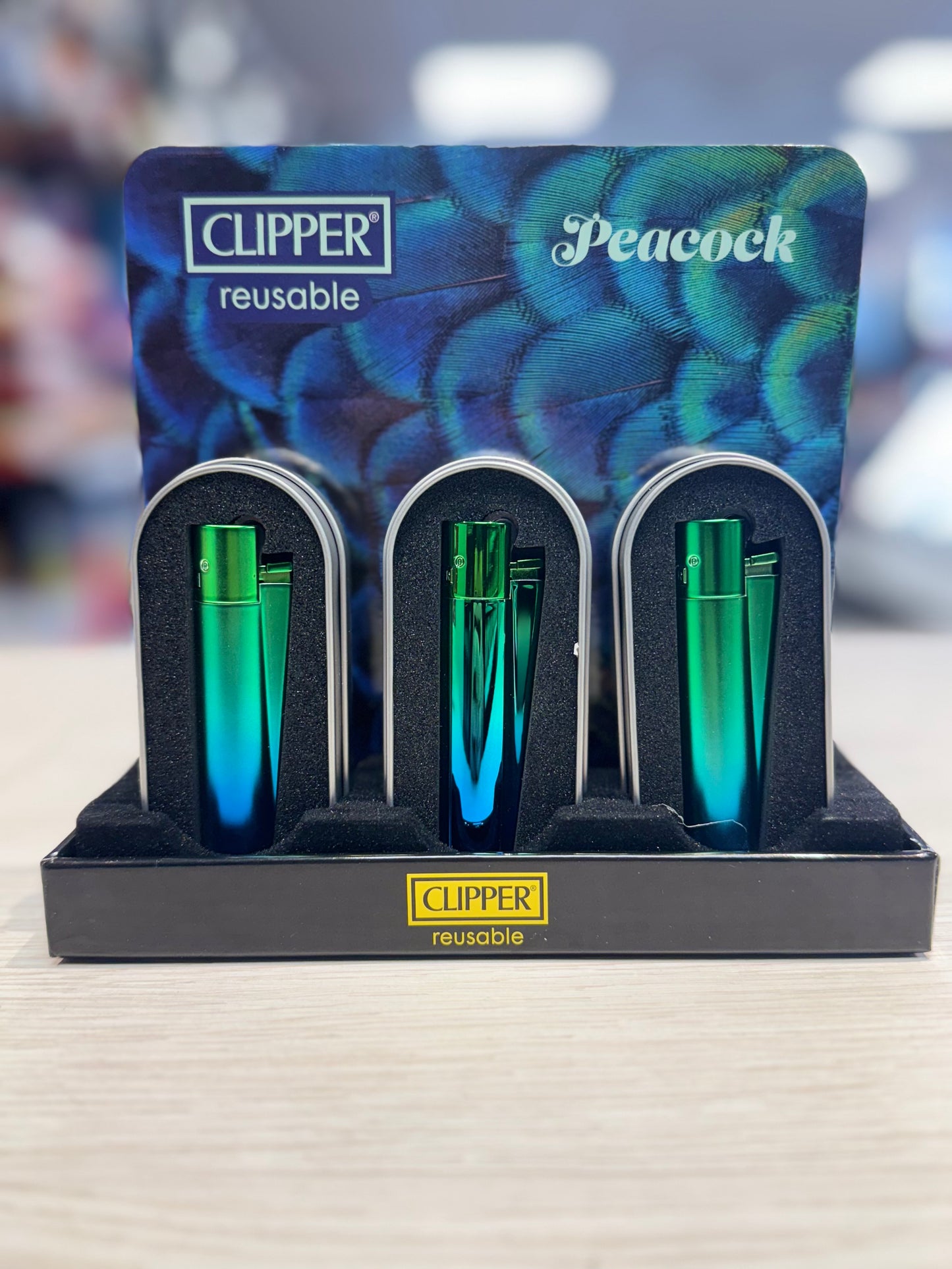 CLIPPER PEACOCK METAL